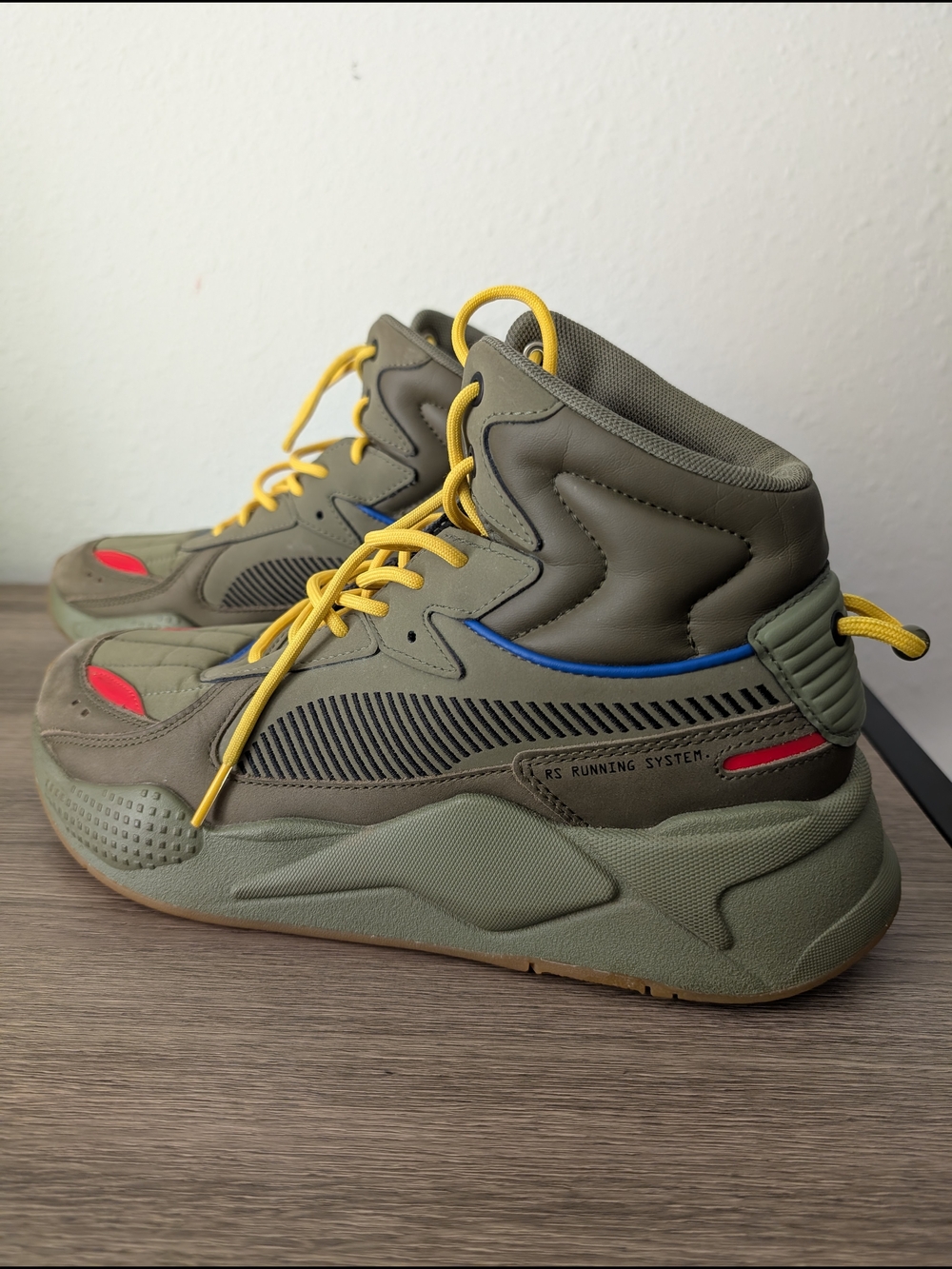Puma Olive Green High-Top Sneakers with Yellow Laces